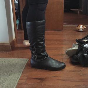 Black flat high boots