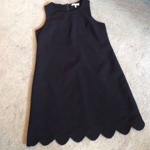 Little black dress with scallop bottom