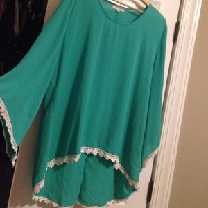 flowy turquoise shirt with flower design