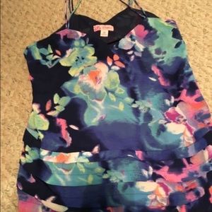 Criss cross backing on this very colorful top