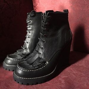 Tory Burch wedge hiking boots.