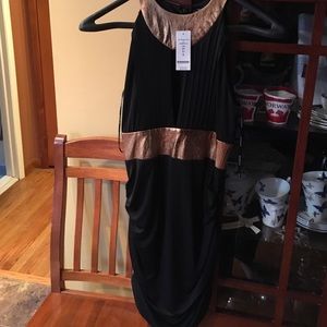 Never worn with tags Bebe dress size small