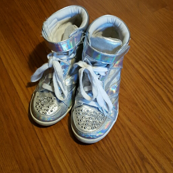 Silver size 6 Justice platform sneakers.