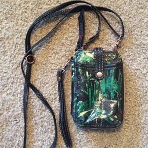 The Sak roots green phone and card holder
