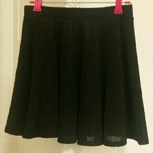 @meganxmikan 2 Black Mini Skirts