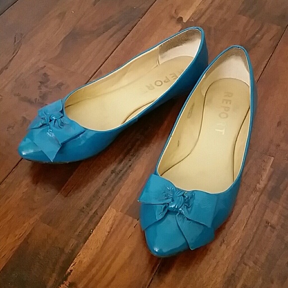 Report Kathryn teal patent bow flat