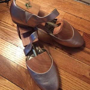 Sleek modern ballet flats in metallic.