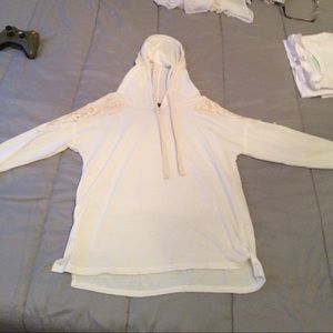 Cream colored long sleeve shirt