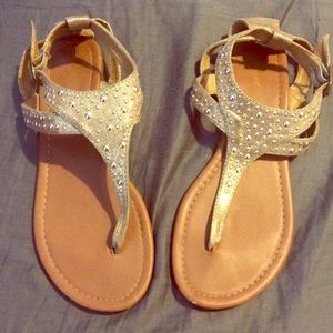 Gold sandals.