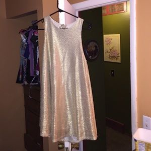 Shimmery gold sleeveless dress!