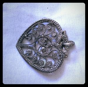 Heart pendant off necklace.