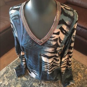 Animal print long sleeve blouse with vneck bling