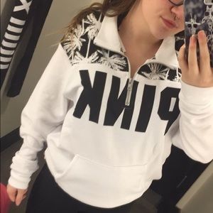 black and white palm tree vs pink half zip