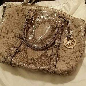 Authentic MK snak skin purse