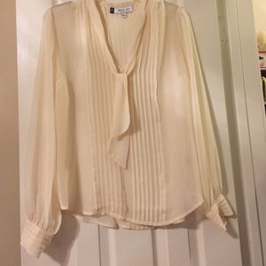 Sheer top by Jennifer Lopez