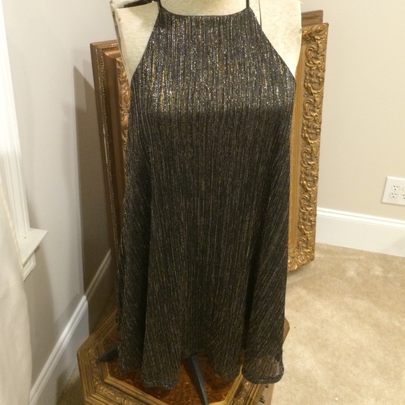 Gorgeous swingy black w/silver/gold vertical filet