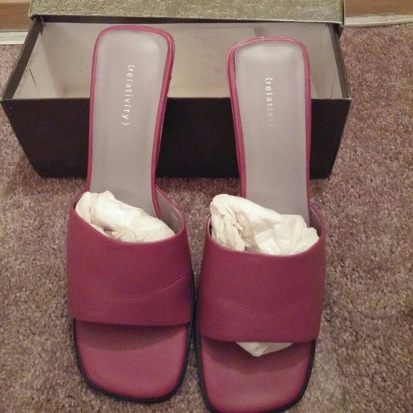 Sandle has a scratch on heal of shoe as shown.
