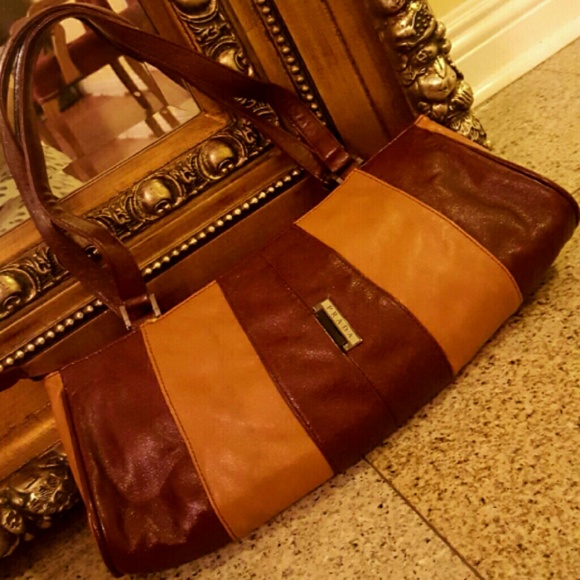 Prada Handbags - PRADA RARE  LEATHER BAG IN GREAT CONDTION