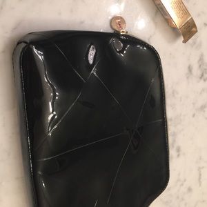 Black Yves Saint Laurent makeup bag on Poshmark  