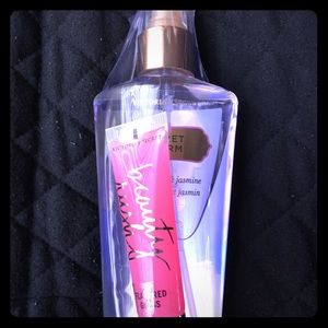 Victoria secret body spray AND lipgloss bundle.