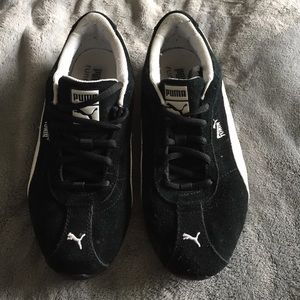 Puma black and white shoes