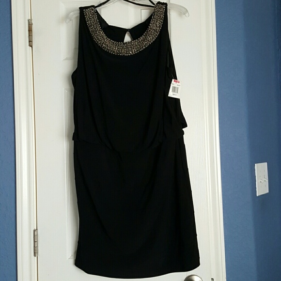 Black dress with beaded neckline.