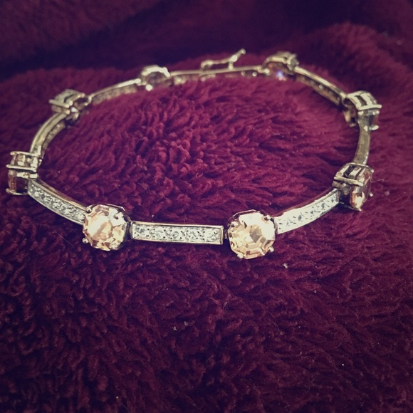 Beautiful sliver bracelet with two tone stones.