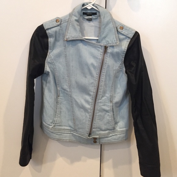 Denim jacket with leather sleeves