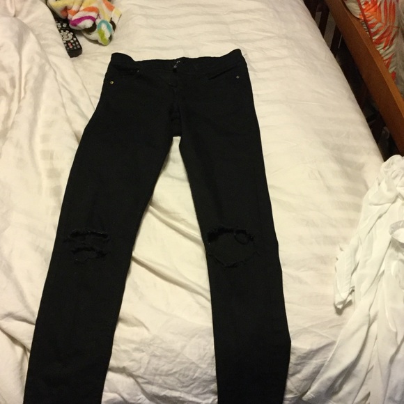 Black h&m skinny pants with rips