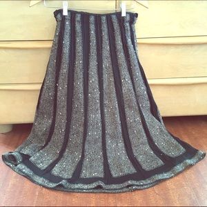 Houndstooth and semi-sheer black skirt