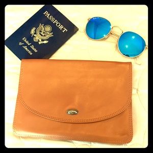 Buttery brown leather wallet. Made in Italy.