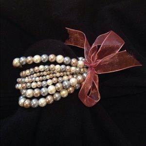 Set of 7 bracelets by Guy and Eva.