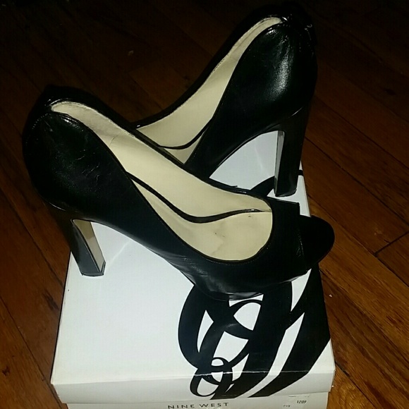 Black leather peep toe pumps
