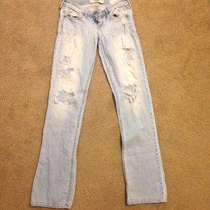 Destroyed bootcut jeans