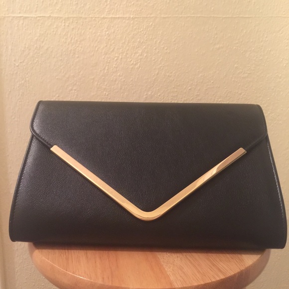 Black pleather clutch bag with gold "V" plate