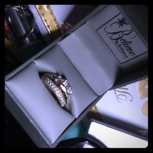 Size 7.5-8gold diamond ring will go lower dont fit