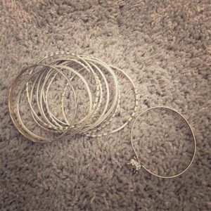 Gold tribal bracelets & an elephant bracelet