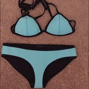 Never before worn, spandex material swimsuit