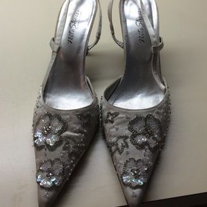 Silver flower beaded sling backs.