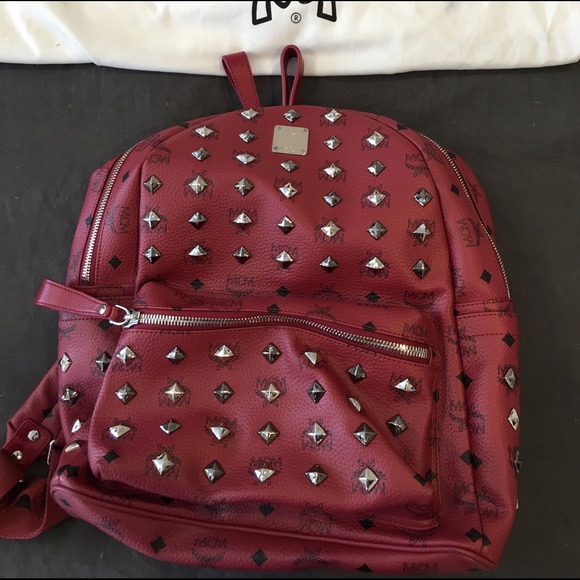 MCM deep red studded Stark backpack