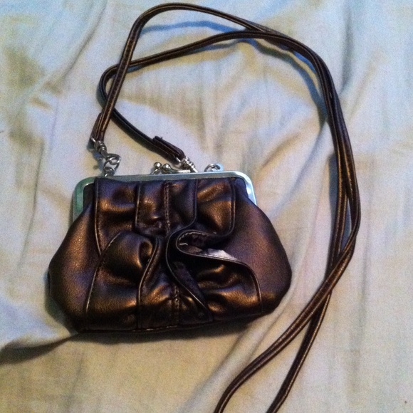 Clutch that turns into a cross body bag