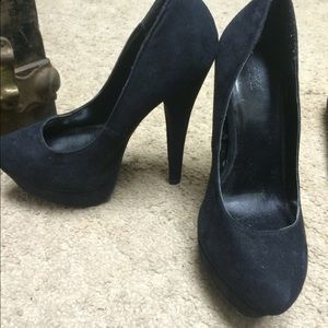Black suede pumps