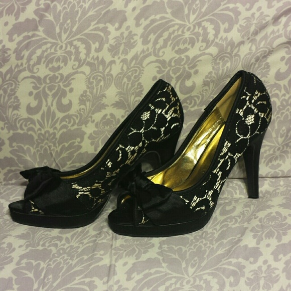 Lace and black peep toe heels