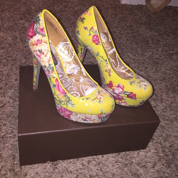 Yellow w/ flower detail. Never worn
