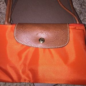 Never worn. Orange .