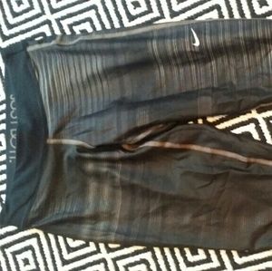 Nike black and gold compression capris