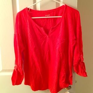 Orange shirt with a pocket