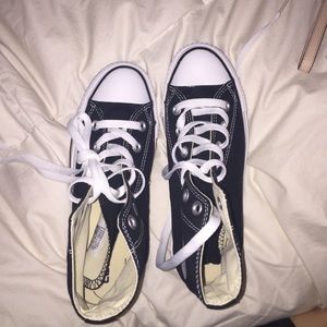 Black high top Chuck Taylor's authentic