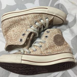 gold tribal print high top converse