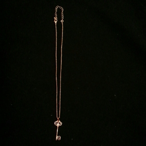 Gold tone key necklace